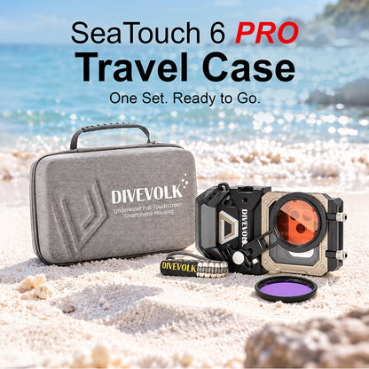 SeaTouch 6 PRO travel case with full kit on beach ¡ª grey carry case, housing with wide-angle lens, red filter, and paracord wrist strap ready for dive trip.
