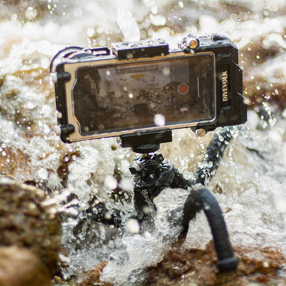 DiveVolk underwater housing with flexible tripod in splashing water