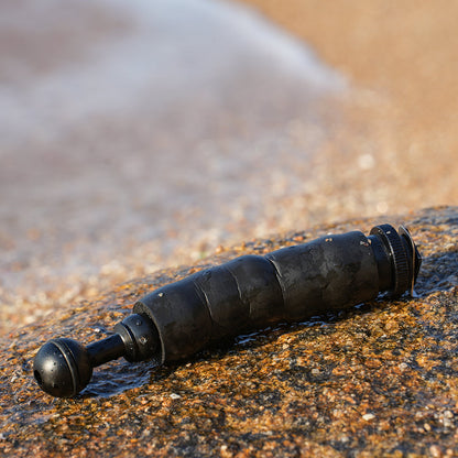 DiveVolk underwater light arm for SeaTouch housing on rock.