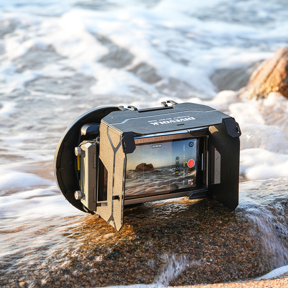 SeaTouch 4 Max underwater housing on beach.