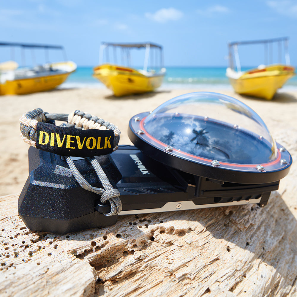DiveVolk SeaTouch 4 Max underwater housing with lanyard on beach