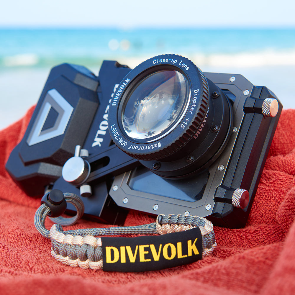 DiveVolk SeaTouch 4 Max housing with lanyard on beach