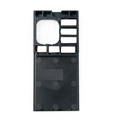 DIVEVOLK SeaTouch 6 PRO phone adapter insert ¡ª black plastic insert with camera cutout and multiple slots for desiccant pad placement, white background.