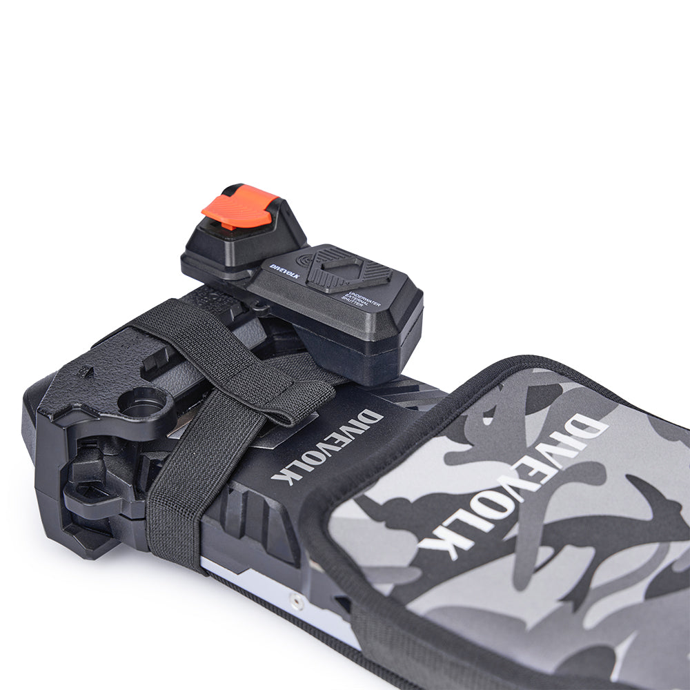 Top-down view of camouflage protective cover over SeaTouch 6 PRO housing ¡ª elastic strap secures cover while external shutter button remains fully accessible.