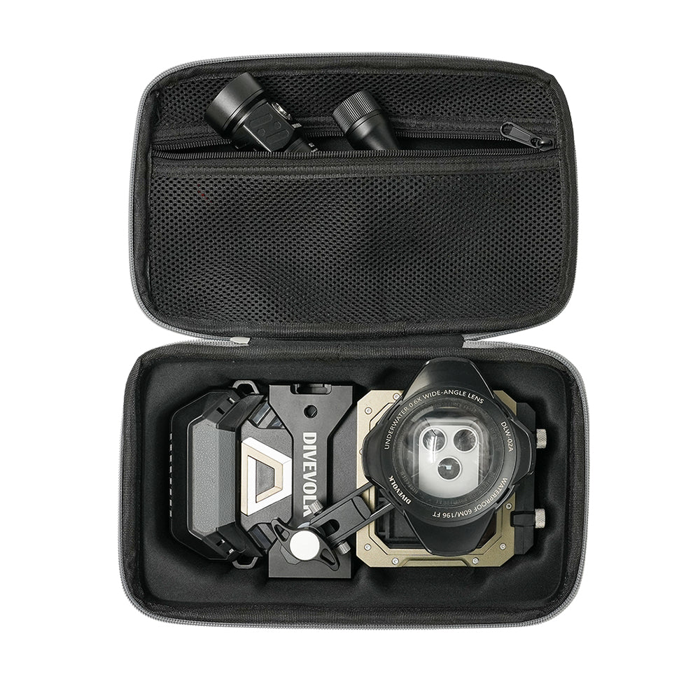 DIVEVOLK travel case top-down view ¡ª molded lower compartment holding SeaTouch 6 PRO housing with wide-angle lens kit, upper mesh pocket storing dive video light and accessories.